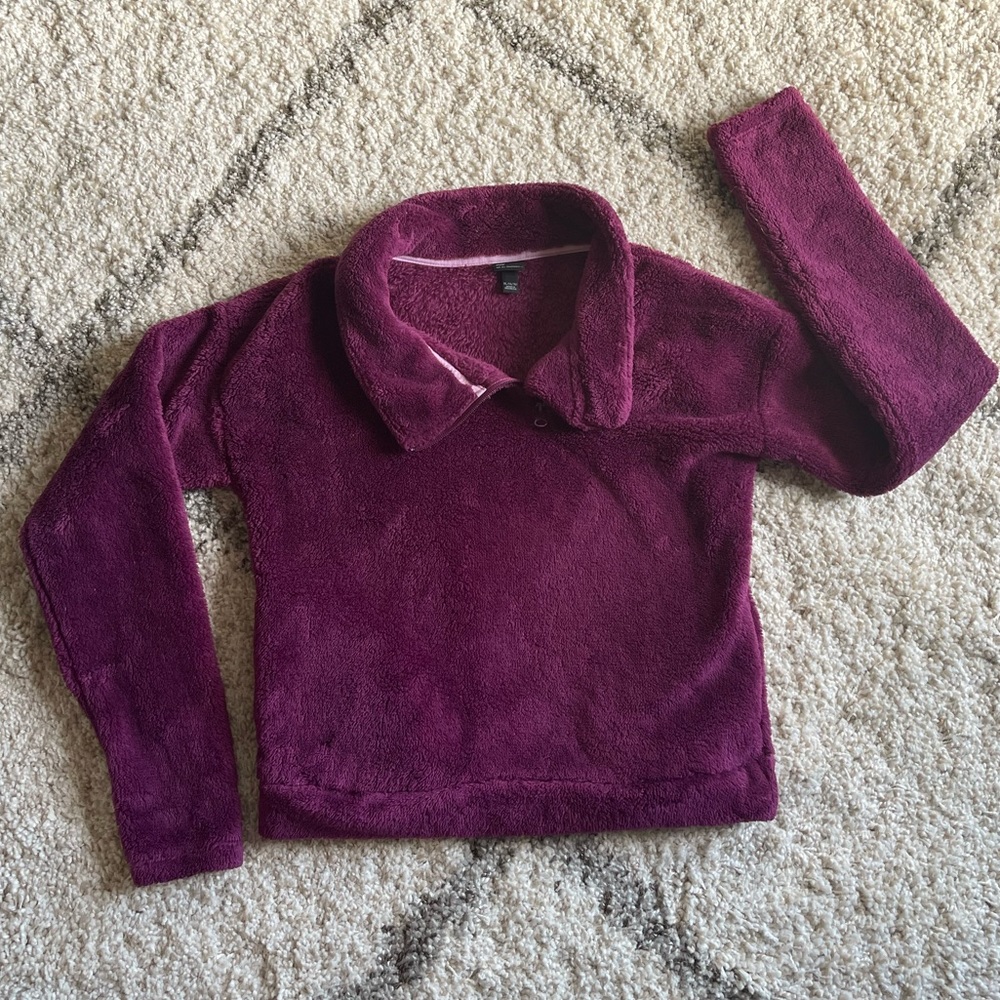 Girls Sherpa half zip pullover. Purple/Plum in color